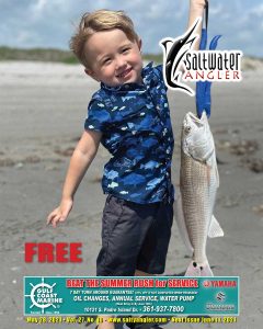 2 year old Boedy Martin with one of several red fish caught on Padre Island National Seashore with fishing guide Jeff Wolda.