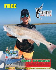 Heather Anderson from Portland, TX. with an upper slot red, caught in Lydia Ann Channel using cut mullet.