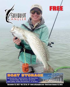 Erin Holekamp with a healthy speckled trout caught on a KWiggler 4" paddle tail while wade fishing in Port Mansfield, Texas