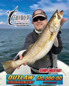 Trout enthusiast Edward Costley with a Baffin Beauty caught on a Saltwater Assassin Opening Night swim shad. Trout was released for the next enthusiast!